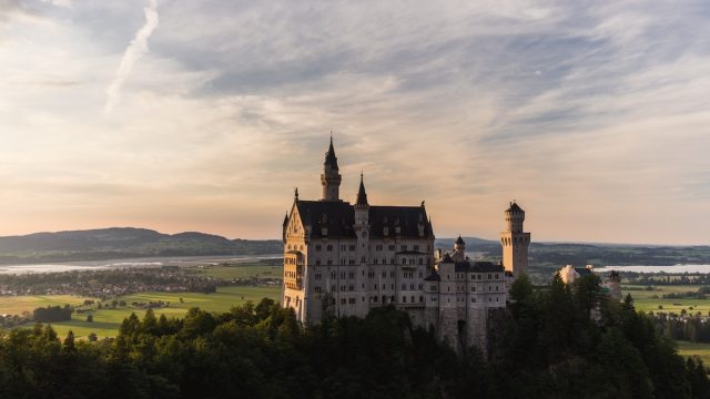 Neuschwanstein castle in Bavaria, Germany at sunset