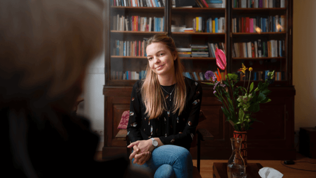 woman sitting in therapist's office