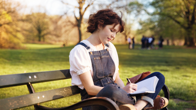 woman reading foreign language poetry