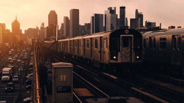 Queens, New York, represented by the 7 train aboveground during sunset in New York.