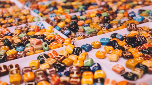 Letter beads representing spelling bees