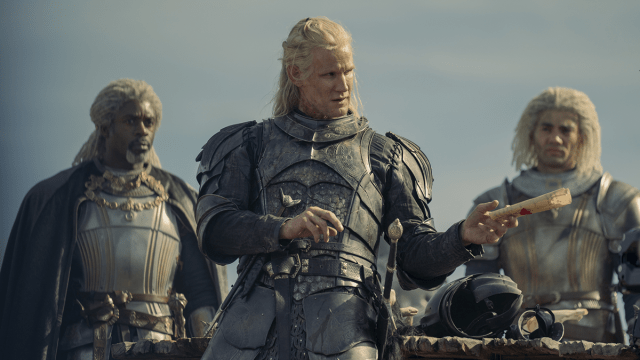 Game of Thrones languages represented by a still from the House of the Dragon featuring Wil Johnson, Matt Smith and Theo Nate